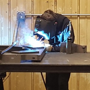 Welder welding, metal fabrication